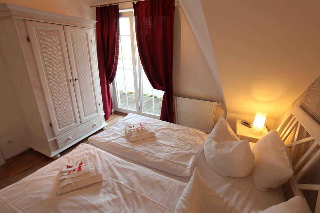 Aparthotel Haus Amo Solem Dierhagen Pokoj fotografie