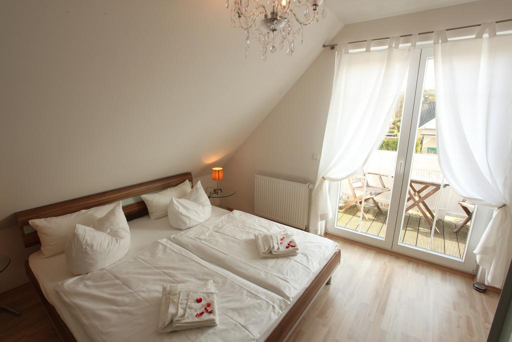Aparthotel Haus Amo Solem Dierhagen Pokoj fotografie